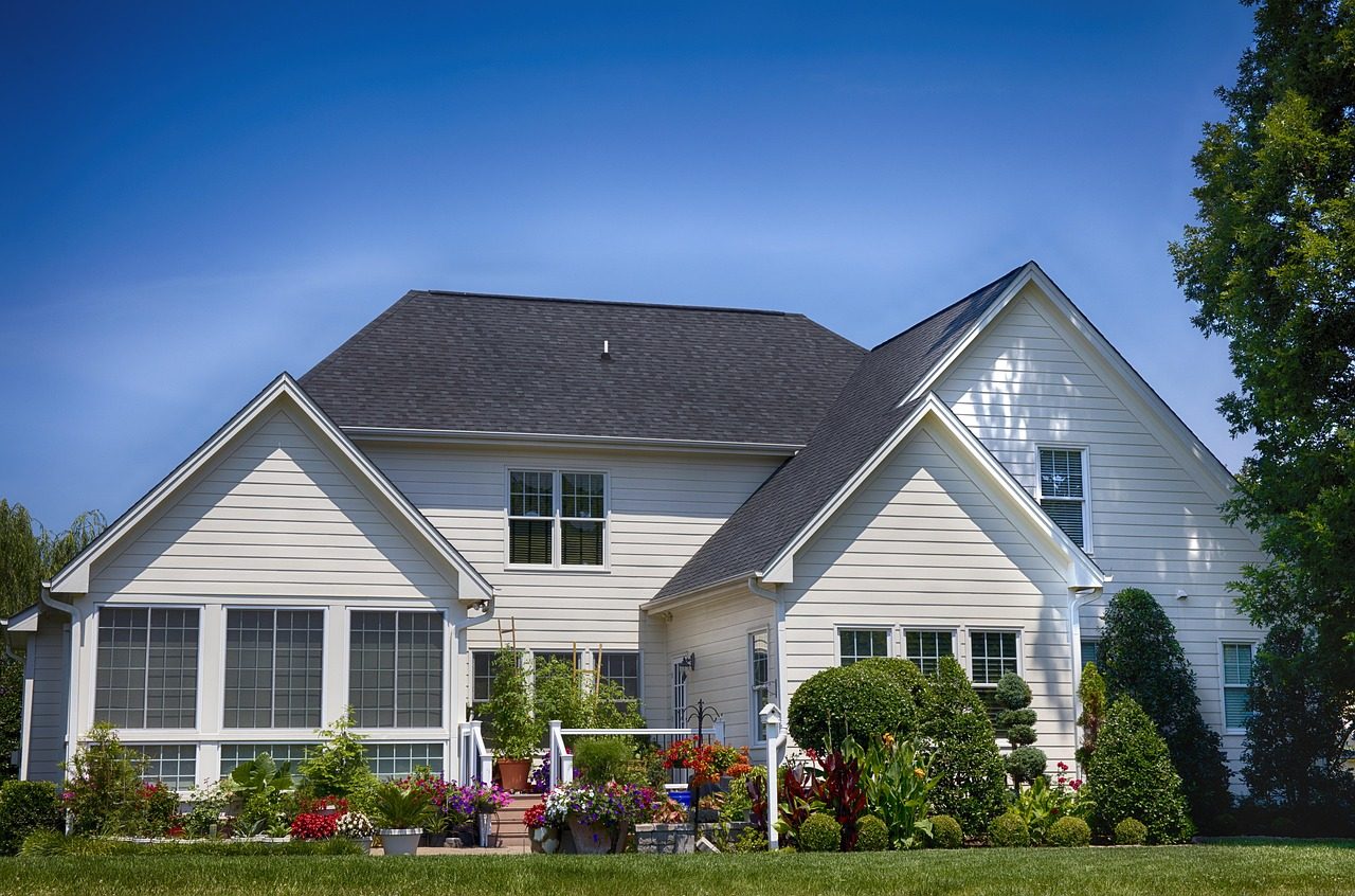 House exterior showing the roofline where skylights have been installed cleanly
